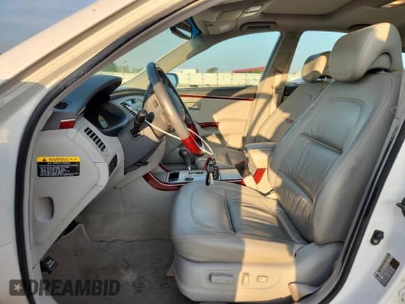 2007 Hyundai Azera SE с VIN KMHFC46F47A203140, выставлен на аукционе Copart как лот 62090625 с пробегом 65 407 миль миль и Списание • Salvage title. История ставок и продаж доступна на DreamBid. Изображение 7.