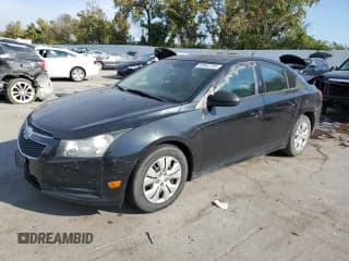 ✅ 2013 Chevrolet Cruze LS • VIN: 1G1PA5SH1D7230731 • Lot: 80943705. Listed on Copart with 146,694 mi. Free auction sales archive from the USA and detailed vehicle history report at DreamBid. Image 1.