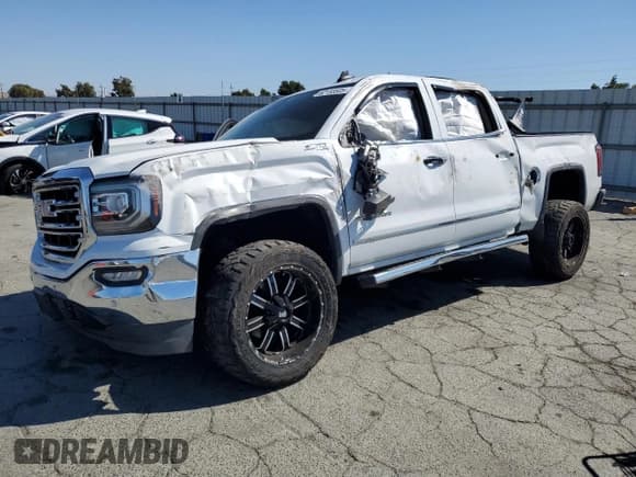 ✅ 2018 GMC Sierra 1500 SLT • VIN: 3GTU2NEJ6JG432860 • Лот: 82153505. Опубликован ранее на Copart с пробегом 96 981 миль. Бесплатный доступ к архиву аукционных продаж из США и подробный отчёт об истории автомобиля на DreamBid. Изображение 1.