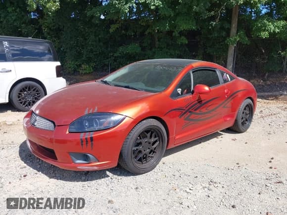 ✅ 2011 Mitsubishi Eclipse GS • VIN: 4A31K5DF2BE002667 • Lot: 43072051. Listed on IAAI with 120,518 mi. Free auction sales archive from the USA and detailed vehicle history report at DreamBid. Image 2.