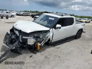 ✅ 2022 Rivian R1T Launch Edition • VIN: 7FCTGAAL6NN003660 • Lot: 67243854. Listed on Copart with Not provided. Free auction sales archive from the USA and detailed vehicle history report at DreamBid. Image 1.