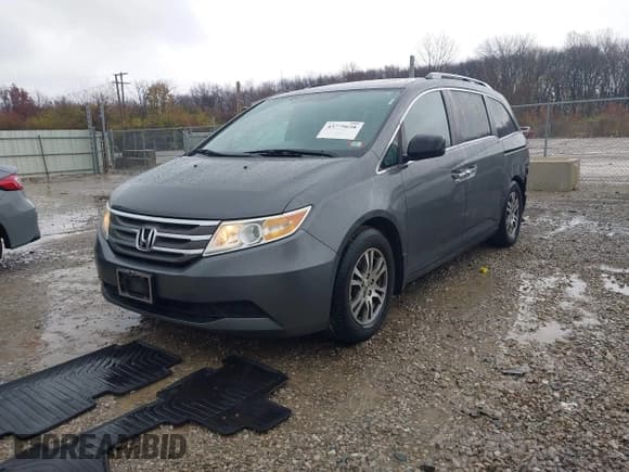 ✅ 2012 Honda Odyssey EX-L • VIN: 5FNRL5H63CB035402 • Lot: 43779658. Listed on IAAI with 170,420 mi. Free auction sales archive from the USA and detailed vehicle history report at DreamBid. Image 2.