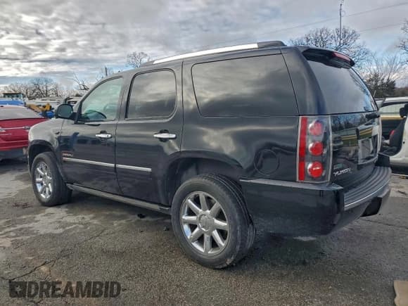 ✅ 2012 GMC Yukon Denali • VIN: 1GKS2EEF4CR286260 • Лот: 94338385. Опубликован ранее на Copart с пробегом 154 975 миль. Бесплатный доступ к архиву аукционных продаж из США и подробный отчёт об истории автомобиля на DreamBid. Изображение 2.