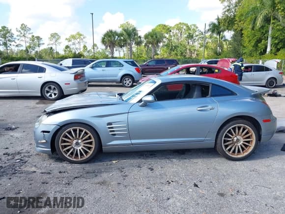 ✅ 2005 Chrysler Crossfire SRT-6 • VIN: 1C3AN79N65X040681 • Лот: 43715112. Опубликован ранее на IAAI с пробегом 114 571 миль. Бесплатный доступ к архиву аукционных продаж из США и подробный отчёт об истории автомобиля на DreamBid. Изображение 14.