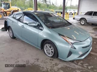 ✅ 2016 Toyota Prius Four • VIN: JTDKARFU9G3024875 • Lot: 42314235. Listed on IAAI with 101,383 mi. Free auction sales archive from the USA and detailed vehicle history report at DreamBid. Image 1.