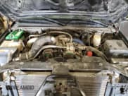 ✅ 2002 Chevrolet Silverado 2500HD LS • VIN: 1GCHK29102E189856 • Лот: 93117935. Опубликован ранее на Copart с пробегом Не указан. Бесплатный доступ к архиву аукционных продаж из США и подробный отчёт об истории автомобиля на DreamBid. Изображение 11.