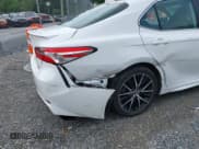 ✅ 2022 Toyota Camry Hybrid SE • VIN: 4T1G31AK9NU038141 • Лот: 42871003. Опубликован ранее на IAAI с пробегом 31 918 миль. Бесплатный доступ к архиву аукционных продаж из США и подробный отчёт об истории автомобиля на DreamBid. Изображение 19.
