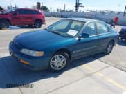 ✅ 1994 Honda Accord LX • VIN: JHMCD563XRC103632 • Lot: 42216235. Listed on IAAI with 209,424 mi. Free auction sales archive from the USA and detailed vehicle history report at DreamBid. Image 18.