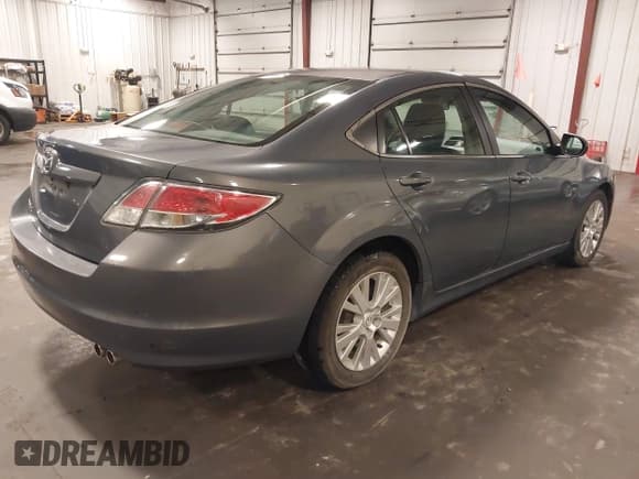 ✅ 2009 Mazda 6 i Touring • VIN: 1YVHP82A895M14379 • Lot: 42585352. Listed on IAAI with 120,532 mi. Free auction sales archive from the USA and detailed vehicle history report at DreamBid. Image 4.