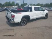 ✅ 2023 Toyota Tacoma SR5 • VIN: 3TMDZ5BN5PM142395 • Lot: 42948374. Listed on IAAI with 36,490 mi. Free auction sales archive from the USA and detailed vehicle history report at DreamBid. Image 4.