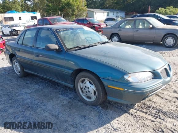 ✅ 1996 Pontiac Grand Am SE • VIN: 1G2NE52M7TC721718 • Lot: 43268073. Wystawiony na IAAI z przebiegiem 115 223 mil. Bezpłatny archiwum sprzedaży aukcyjnych z USA i szczegółowy raport historii pojazdu na DreamBid. Zdjęcie 1.
