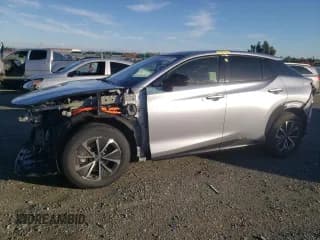 ✅ 2023 Lexus RZ 450e Premium • VIN: JTJAAAAB0PA016319 • Lot: 87233794. Wystawiony na Copart z przebiegiem 13 858 mil. Bezpłatny archiwum sprzedaży aukcyjnych z USA i szczegółowy raport historii pojazdu na DreamBid. Zdjęcie 1.