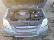 ✅ 2004 Kia Rio • VIN: KNADC125946336107 • Лот: 79957854. Опубликован ранее на Copart с пробегом 201 254 миль. Бесплатный доступ к архиву аукционных продаж из США и подробный отчёт об истории автомобиля на DreamBid. Изображение 11.