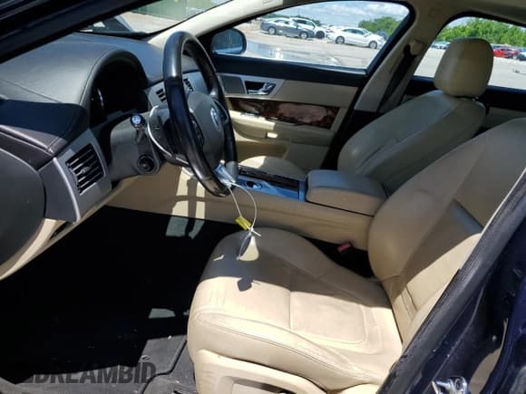 ✅ 2012 Jaguar XF • VIN: SAJWA0FB1CLS45779 • Lot: 57646625. Listed on Copart with 107,001 mi. Free auction sales archive from the USA and detailed vehicle history report at DreamBid. Image 7.