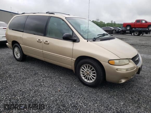 ✅ 1999 Chrysler Town & Country LX • VIN: 1C4GP54L1XB862234 • Lot: 54476795. Wystawiony na Copart z przebiegiem 249 429 mil. Bezpłatny archiwum sprzedaży aukcyjnych z USA i szczegółowy raport historii pojazdu na DreamBid. Zdjęcie 4.