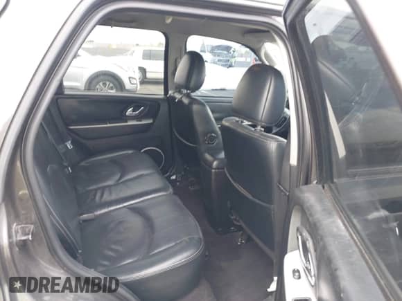 2006 Mercury Mariner Luxury с VIN 4M2YU56186KJ01007, выставлен на аукционе IAAI как лот 42619715 с пробегом 157 209 миль миль и . История ставок и продаж доступна на DreamBid. Изображение 8.