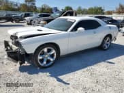 ✅ 2012 Dodge Challenger SXT • VIN: 2C3CDYAG4CH206728 • Lot: 74813574. Wystawiony na Copart z przebiegiem 158 848 mil. Bezpłatny archiwum sprzedaży aukcyjnych z USA i szczegółowy raport historii pojazdu na DreamBid. Zdjęcie 1.