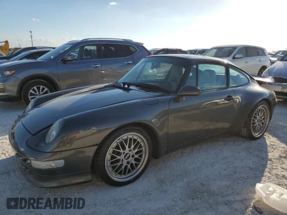 ✅ 1995 Porsche 911 Carrera • VIN: WP0AA2994SS323280 • Lot: 75304104. Wystawiony na Copart z przebiegiem 105 675 mil. Bezpłatny archiwum sprzedaży aukcyjnych z USA i szczegółowy raport historii pojazdu na DreamBid. Zdjęcie 1.