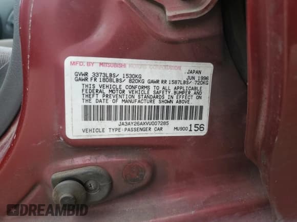 ✅ 1997 Mitsubishi Mirage DE • VIN: JA3AY26AXVU007285 • Lot: 71958454. Listed on Copart with 156,415 mi. Free auction sales archive from the USA and detailed vehicle history report at DreamBid. Image 12.