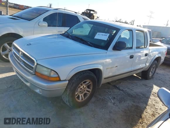 ✅ 2002 Dodge Dakota SLT • VIN: 1B7HL48N72S586317 • Lot: 41736566. Wystawiony na IAAI z przebiegiem Nie podano. Bezpłatny archiwum sprzedaży aukcyjnych z USA i szczegółowy raport historii pojazdu na DreamBid. Zdjęcie 2.