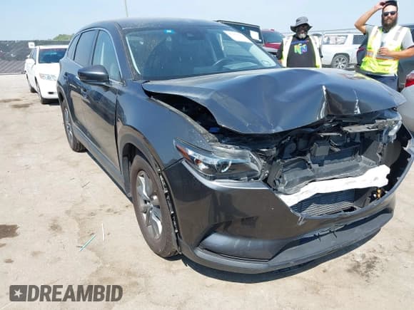 ✅ 2023 Mazda CX-9 Touring • VIN: JM3TCBCY1P0647669 • Lot: 43271567. Listed on IAAI with 39,982 mi. Free auction sales archive from the USA and detailed vehicle history report at DreamBid. Image 1.