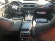 ✅ 2016 Audi S7 • VIN: WAUW2AFC7GN079947 • Лот: 65709985. Опубликован ранее на Copart с пробегом 104 064 миль. Бесплатный доступ к архиву аукционных продаж из США и подробный отчёт об истории автомобиля на DreamBid. Изображение 8.