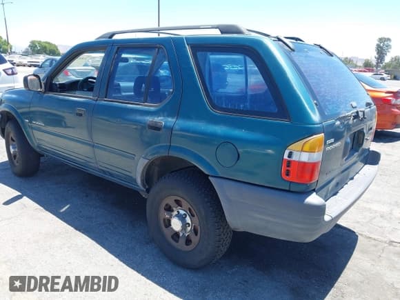 ✅ 1998 Isuzu Rodeo S • VIN: 4S2CK58W9W4313907 • Lot: 42843094. Listed on IAAI with 252,428 mi. Free auction sales archive from the USA and detailed vehicle history report at DreamBid. Image 3.