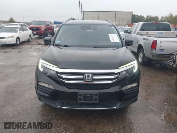 ✅ 2018 Honda Pilot Touring • VIN: 5FNYF5H99JB017044 • Lot: 43821143. Listed on IAAI with 156,739 mi. Free auction sales archive from the USA and detailed vehicle history report at DreamBid. Image 12.