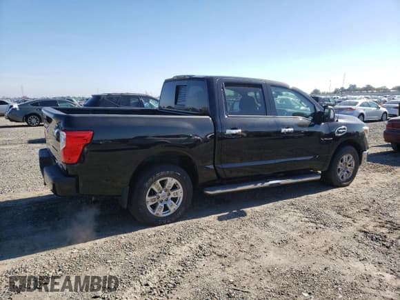 ✅ 2017 Nissan Titan Pro-4X • VIN: 1N6AA1E59HN570084 • Лот: 90293395. Опубликован ранее на Copart с пробегом 126 506 миль. Бесплатный доступ к архиву аукционных продаж из США и подробный отчёт об истории автомобиля на DreamBid. Изображение 3.