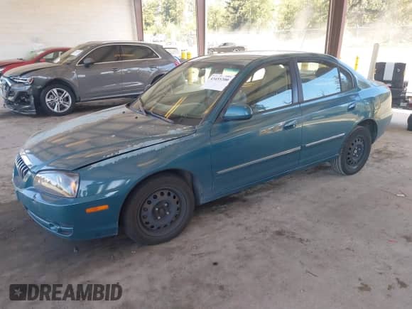 2006 Hyundai Elantra GLS with VIN KMHDN46D76U319638, listed as a IAAI auction lot 43455200 with 158,184 mi miles and . Bid and sale history available at DreamBid. Image 2.