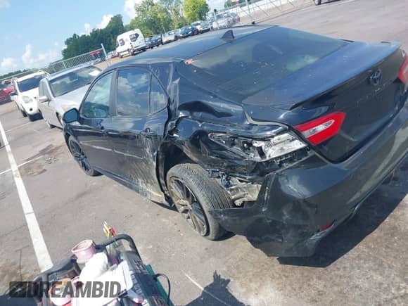 2019 Toyota Camry LE with VIN 4T1B11HK8KU256007, listed as a IAAI auction lot 42930126 with 107,264 mi miles and . Bid and sale history available at DreamBid. Image 3.