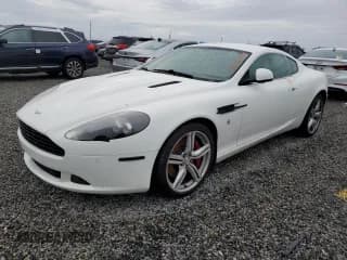 ✅ 2011 Aston Martin DB9 • VIN: SCFFDAAE8BGA13186 • Lot: 74703544. Wystawiony na Copart z przebiegiem Nie podano. Bezpłatny archiwum sprzedaży aukcyjnych z USA i szczegółowy raport historii pojazdu na DreamBid. Zdjęcie 1.