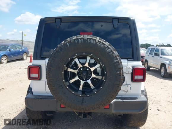 ✅ 2022 Jeep Wrangler Unlimited Sahara • VIN: 1C4HJXEN5NW144922 • Lot: 42452901. Listed on IAAI with 51,223 mi. Free auction sales archive from the USA and detailed vehicle history report at DreamBid. Image 16.