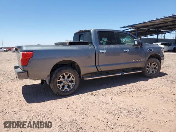 ✅ 2018 Nissan Titan Platinum Reserve • VIN: 1N6BA1F4XJN528717 • Lot: 65547335. Listed on Copart with 79,921 mi. Free auction sales archive from the USA and detailed vehicle history report at DreamBid. Image 3.