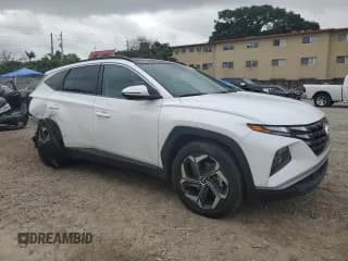 ✅ 2022 Hyundai Tucson SEL Convenience • VIN: KM8JFCA14NU052139 • Lot: 72435343. Wystawiony na Copart z przebiegiem 22 662 mil. Bezpłatny archiwum sprzedaży aukcyjnych z USA i szczegółowy raport historii pojazdu na DreamBid. Zdjęcie 4.