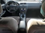 ✅ 1999 Nissan Maxima GXE • VIN: JN1CA21D8XT803822 • Lot: 64638365. Wystawiony na Copart z przebiegiem 203 700 mil. Bezpłatny archiwum sprzedaży aukcyjnych z USA i szczegółowy raport historii pojazdu na DreamBid. Zdjęcie 8.