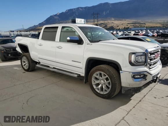 ✅ 2018 GMC Sierra 1500 SLT • VIN: 3GTU2NEC7JG486542 • Лот: 69309425. Опубликован ранее на Copart с пробегом 162 097 миль. Бесплатный доступ к архиву аукционных продаж из США и подробный отчёт об истории автомобиля на DreamBid. Изображение 4.