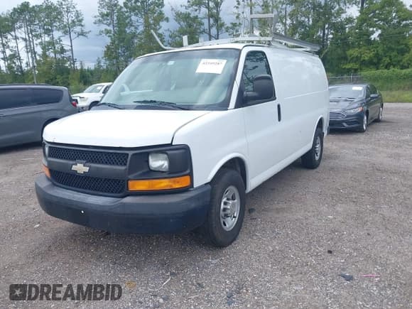 ✅ 2013 Chevrolet Express Cargo • VIN: 1GCWGFCA2D1158787 • Lot: 43349287. Listed on IAAI with 189,483 mi. Free auction sales archive from the USA and detailed vehicle history report at DreamBid. Image 2.