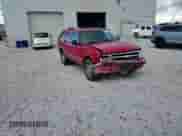 1996 Chevrolet Blazer z VIN 1GNDT13W7T2138892, wystawiony jako Copart lot #79970274 z przebiegiem 192 084 mil mil oraz Szkoda całkowita • Salvage title. Historia ofert i sprzedaży dostępna na DreamBid. Obrazek 12.