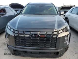2023 Hyundai Palisade XRT с VIN KM8R34GE9PU508277, выставлен на аукционе Copart как лот 76411404 с пробегом 7 033 миль миль и На запчасти • Non repairable. История ставок и продаж доступна на DreamBid. Изображение 5.