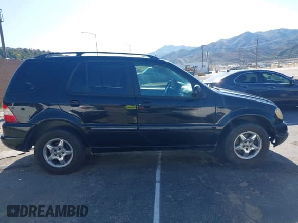 ✅ 2001 Mercedes-Benz M 320/430/500 • VIN: 4JGAB54E01A272539 • Лот: 42124321. Опубликован ранее на IAAI с пробегом 272 098 миль. Бесплатный доступ к архиву аукционных продаж из США и подробный отчёт об истории автомобиля на DreamBid. Изображение 13.