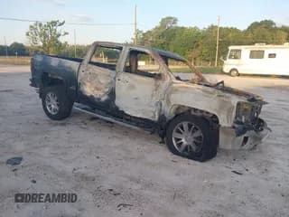 ✅ 2018 Chevrolet Silverado 1500 High Country • VIN: 3GCUKTECXJG418143 • Lot: 42500690. Listed on IAAI with Not provided. Free auction sales archive from the USA and detailed vehicle history report at DreamBid. Image 1.