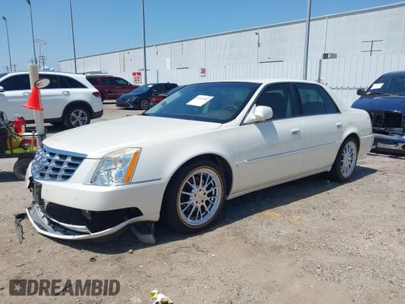 ✅ 2008 Cadillac DTS 1SC • VIN: 1G6KD57Y88U190045 • Lot: 41994989. Listed on IAAI with 96,714 mi. Free auction sales archive from the USA and detailed vehicle history report at DreamBid. Image 2.