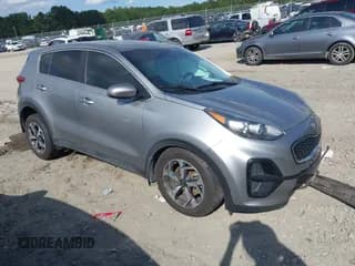 ✅ 2021 Kia Sportage LX • VIN: KNDPM3AC9M7929243 • Lot: 43205844. Listed on IAAI with 73,333 mi. Free auction sales archive from the USA and detailed vehicle history report at DreamBid. Image 1.