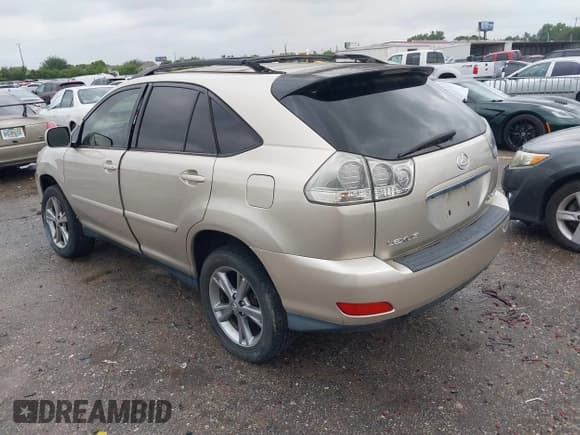 ✅ 2006 Lexus RX 400h • VIN: JTJHW31U060004642 • Lot: 42207589. Wystawiony na IAAI z przebiegiem 158 506 mil. Bezpłatny archiwum sprzedaży aukcyjnych z USA i szczegółowy raport historii pojazdu na DreamBid. Zdjęcie 3.