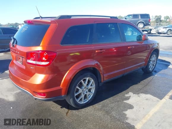✅ 2014 Dodge Journey SXT • VIN: 3C4PDCBB4ET143465 • Lot: 43656968. Listed on IAAI with 138,259 mi. Free auction sales archive from the USA and detailed vehicle history report at DreamBid. Image 4.