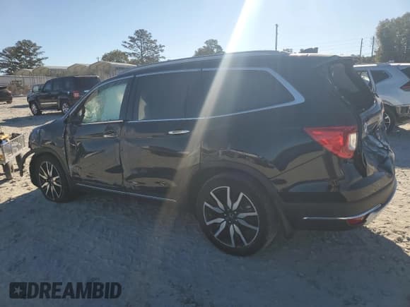✅ 2019 Honda Pilot Touring 8-Passenger • VIN: 5FNYF5H99KB013691 • Lot: 76752734. Listed on Copart with Not provided. Free auction sales archive from the USA and detailed vehicle history report at DreamBid. Image 2.