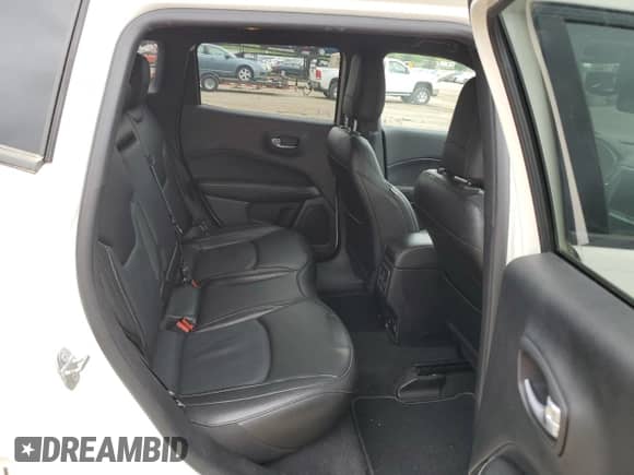 2021 Jeep Compass 80th Anniversary z VIN 3C4NJDEB1MT561871, wystawiony jako Copart lot #56173465 z przebiegiem 59 661 mil mil oraz Szkoda całkowita • Salvage title. Historia ofert i sprzedaży dostępna na DreamBid. Obrazek 11.