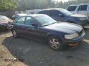 ✅ 1997 Acura TL Premium • VIN: JH4UA3650VC001754 • Lot: 66266715. Listed on Copart with 128,350 mi. Free auction sales archive from the USA and detailed vehicle history report at DreamBid. Image 4.