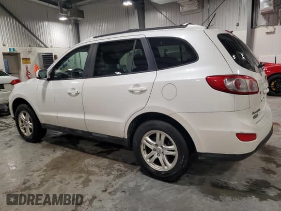 ✅ 2012 Hyundai Santa Fe GLS • VIN: 5XYZGDAG0CG145737 • Lot: 83188604. Listed on Copart with 219,523 mi. Free auction sales archive from the USA and detailed vehicle history report at DreamBid. Image 2.